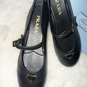 Prada Black Leather Mary Jane Flats with Gold Triangle Emblem